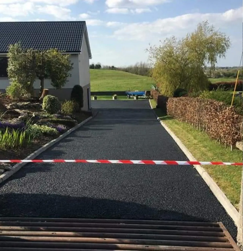 closed of freshly tarmacked drive